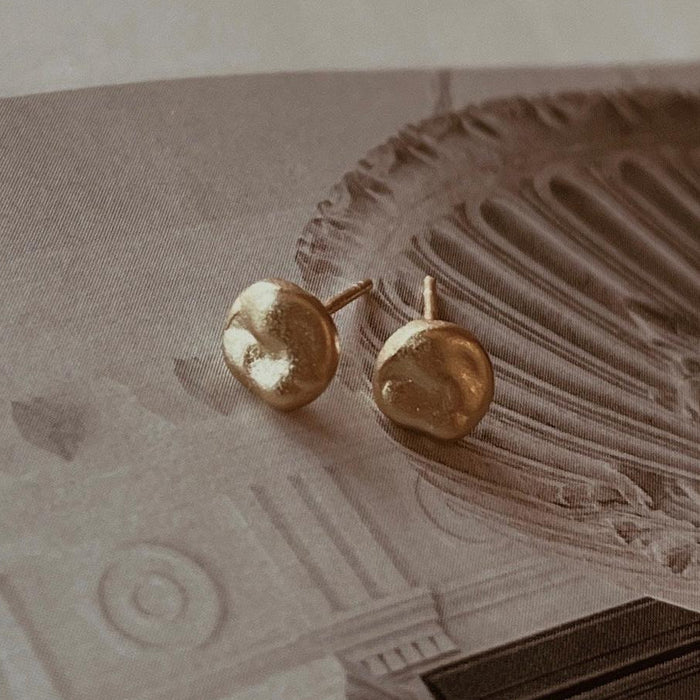 Gold bead earring studs in minimalist design