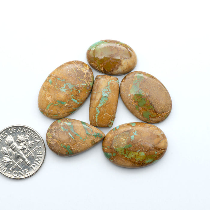 These Crow Springs Ribbon Turquoise Cabochons have a rich color and matrix that are sure to add a unique touch to a variety of jewelry pieces.