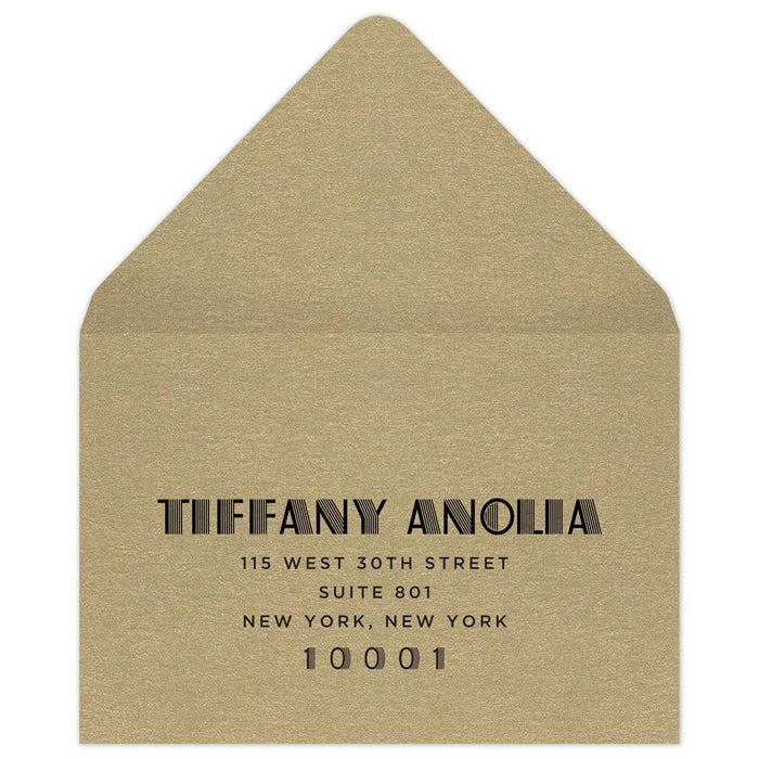 Gold reply envelope with black deco font centered on the front of the envelope.