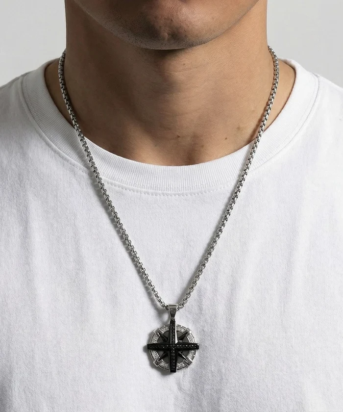 Close-up of Link N Lock® black cubic zirconia compass pendant