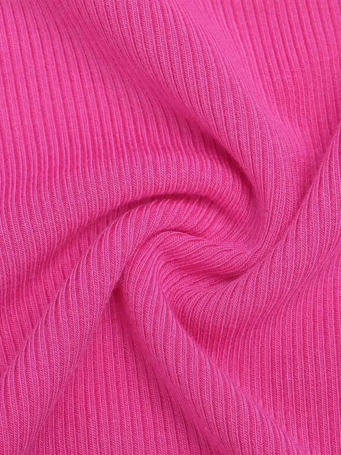 Textured pink modal fabric detail of Popilush® crop top, soft and elegant.