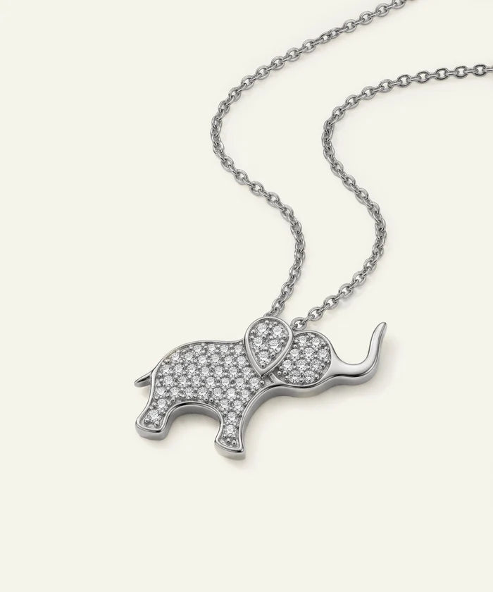 Silver elephant pendant necklace on a white background