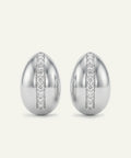 Pair of silver earrings with diamond accents on a white background