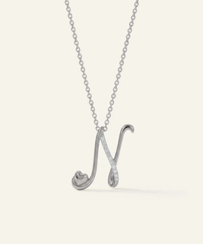 Silver necklace with a unique pendant on a white background