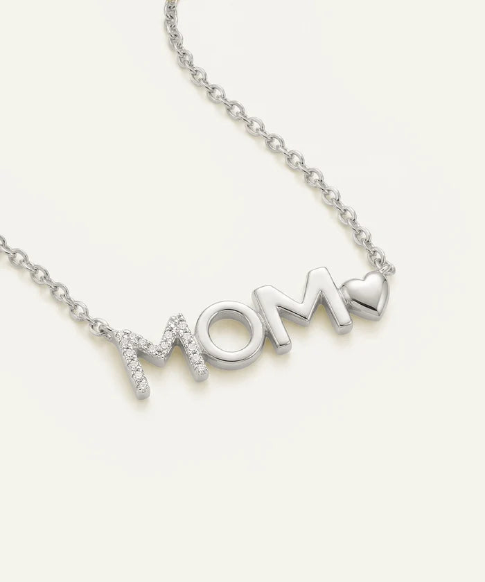 Silver 'MOM' necklace with a heart on a white background