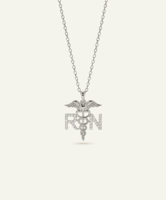 Silver necklace with a caduceus pendant and 'RN' letters on a white background
