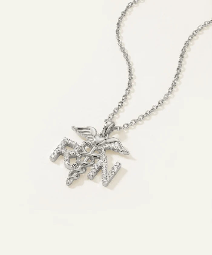 Silver necklace with a caduceus pendant on a white background