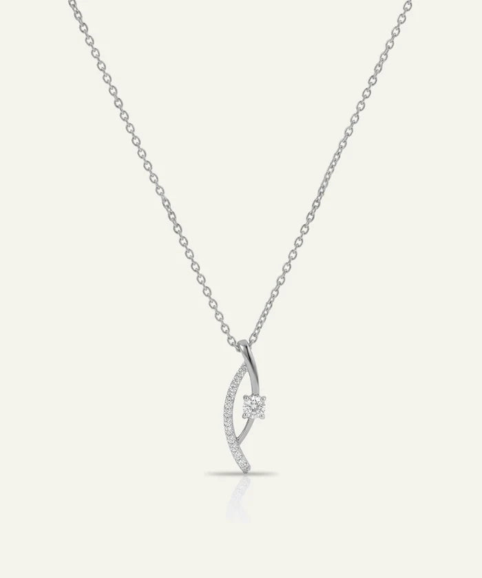 Silver necklace with a delicate pendant on a white background