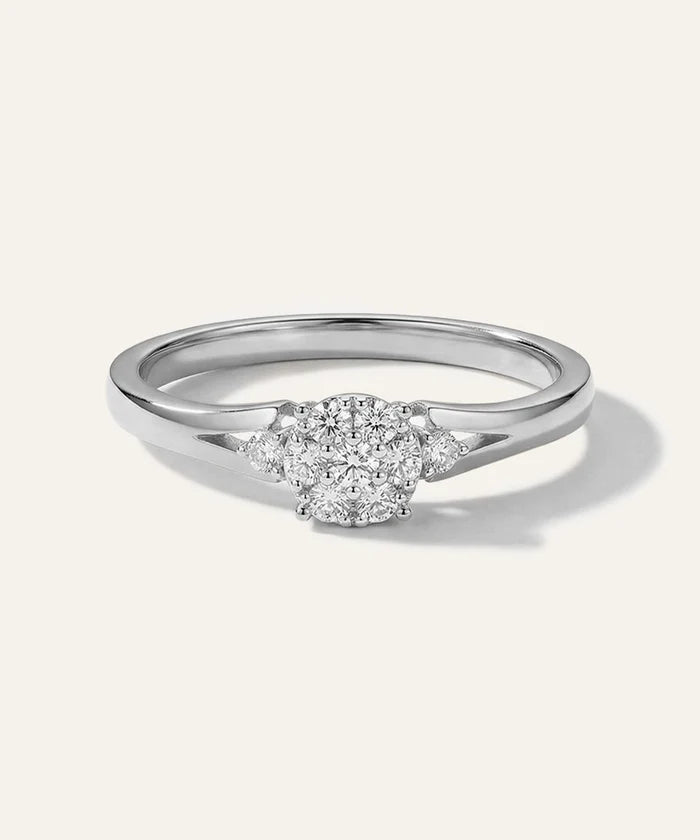 Diamond ring on a light gray background