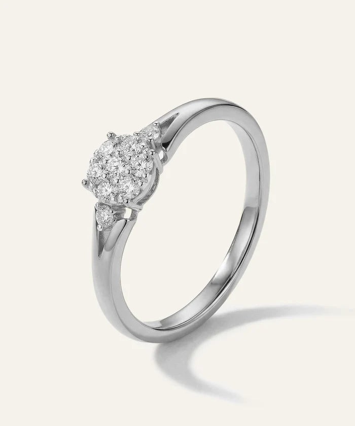 Diamond ring on a light gray background