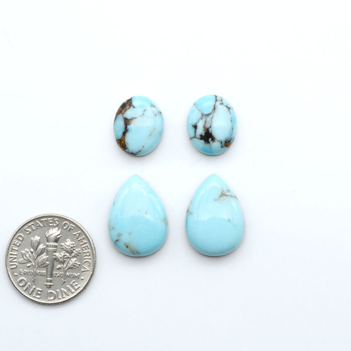 Enhance your jewelry designs with Pressed Turquoise Nugget Cabochons. Crafted from composite materials they add a captivating touch to your creations.