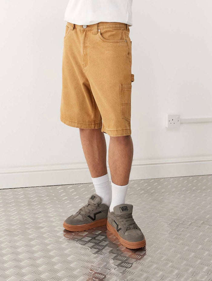 Santa Cruz carpenter big denim shorts in Washed Brown
