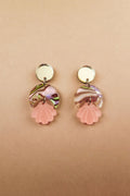 Handmade gold and marbled pink Seashell Earrings with circular tops, lightweight translucent marbled middles, and pink shell-shaped pendants, displayed on a light beige background.