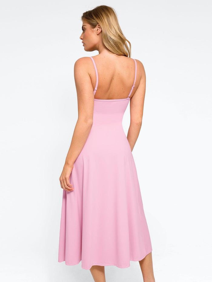 Back view of pink A-line midi slip dress with built-in sculpting shapewear