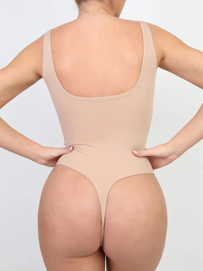 Beige seamless CloudSense Tank Top high-cut thong bodysuit shapewear, smooth fit from back.