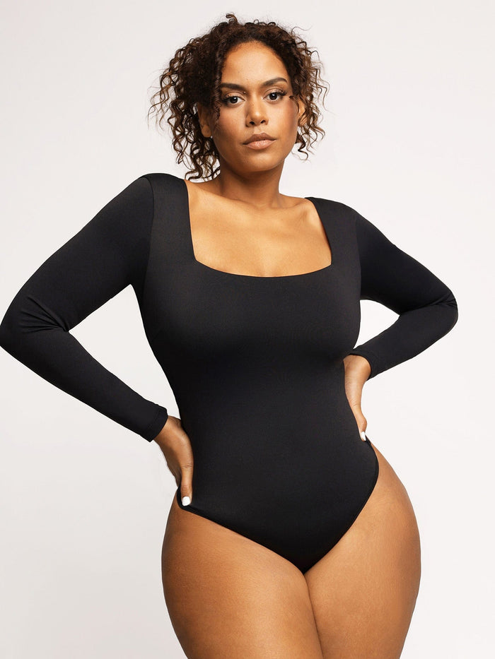 Black long sleeve square neck bodysuit offering tummy control and shaping.