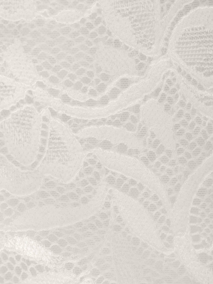 Intricate white lace from Popilush® shapewear bodysuit, elegant fabric.
