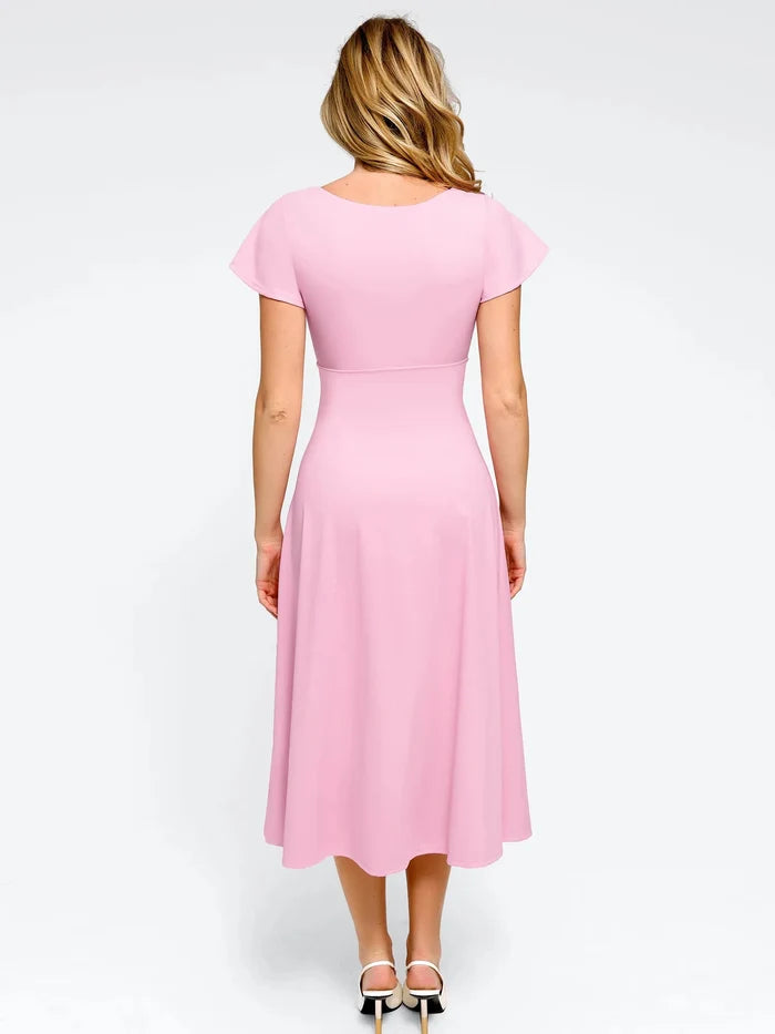 Sculpting pink A-line midi shapewear dress with flutter sleeves, back view.