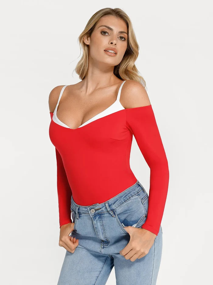 Red long sleeve cold shoulder shapewear bodysuit with white neckline trim, offering tummy control.