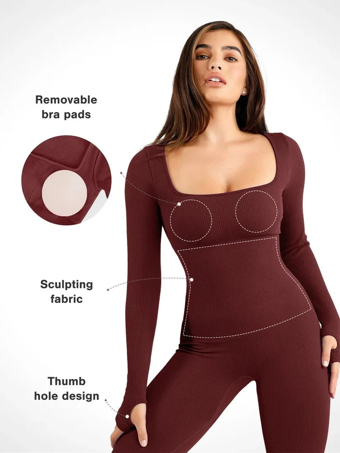 Seamless maroon shapewear jumpsuit: square neck, thumb holes, sculpting fabric.
