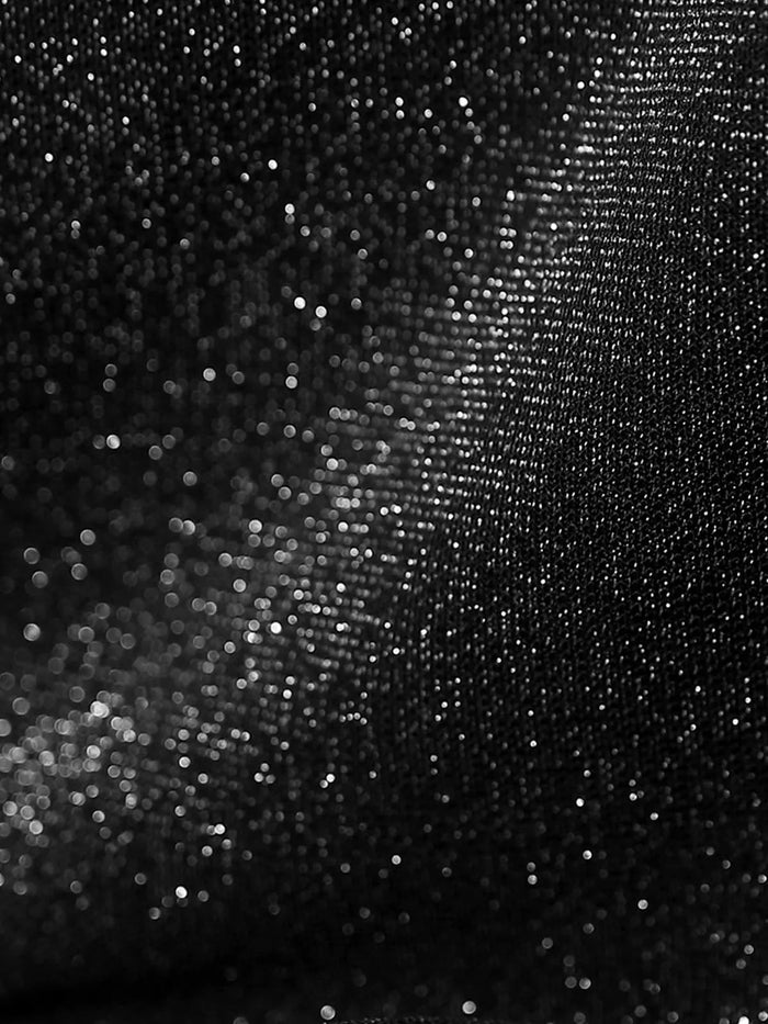 Glamorous sheen of the Popilush® metallic knit fabric used in the slimming bodysuit.