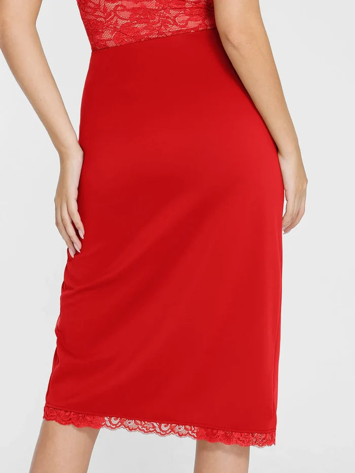Red midi skirt with elegant lace trim at hem and waist, featuring built-in shapewear.