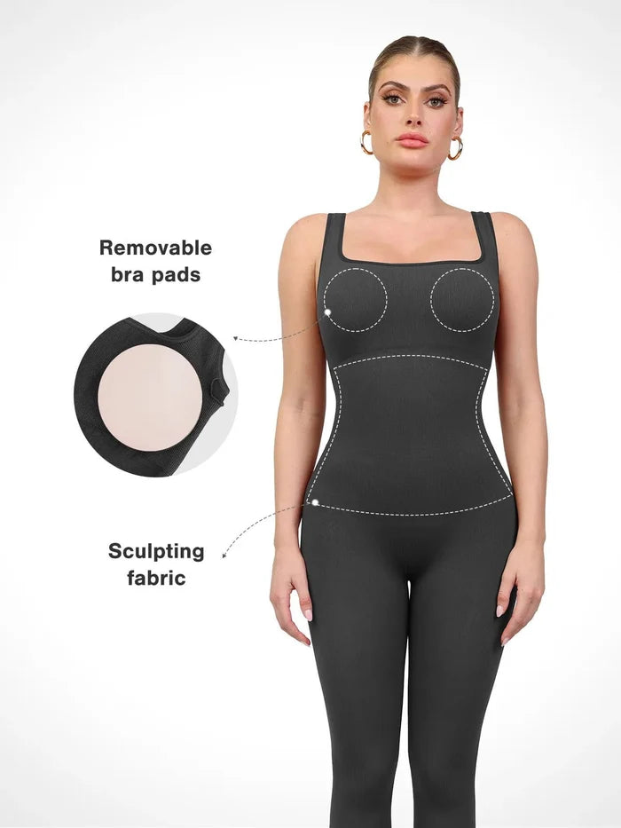 Dark grey seamless square neck shapewear workout jumpsuit with removable bra pads and sculpting waist.