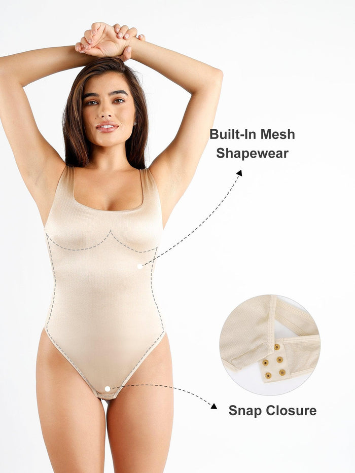 Beige square neck shine thong bodysuit with built-in shaping mesh and snap closure details.