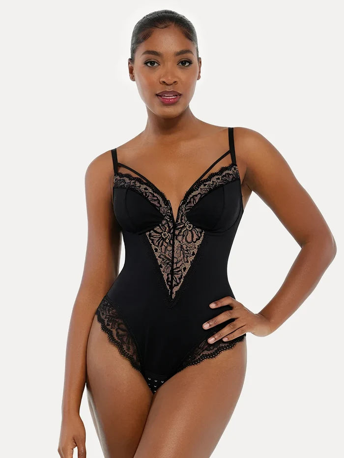 Black strappy shapewear bodysuit with V-neck, detailed floral lace inset, tummy control.