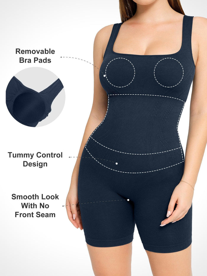 Navy blue ribbed square neck shapewear tank romper with tummy control and removable bra pads.