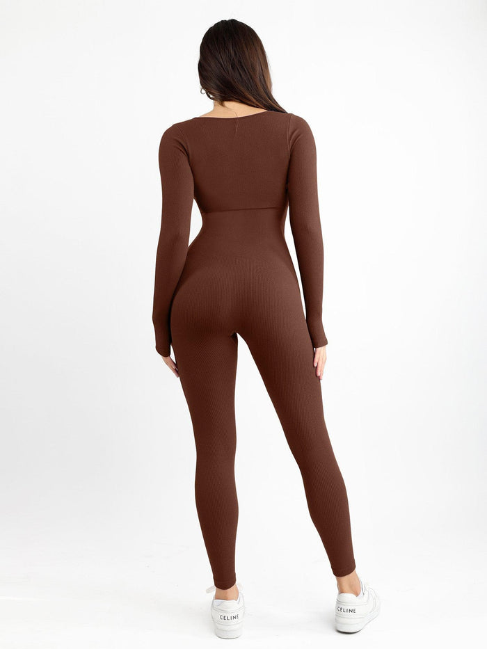 Brown ribbed seamless shapewear jumpsuit with thumb holes, long sleeves, back view.