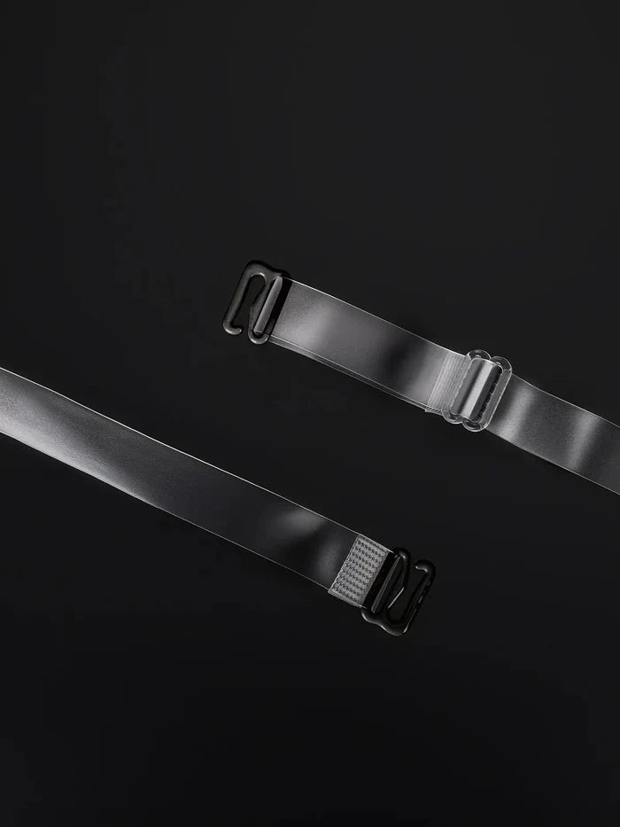 Adjustable transparent bra straps made of TPU with discreet black hardware.
